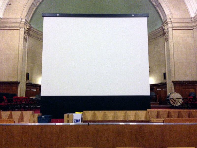 Camstage installed a floor roller screen at a university